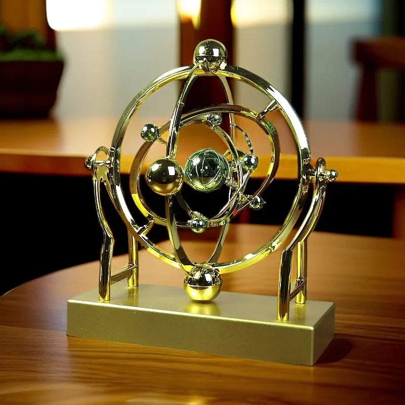Draaiende zonnestelsel bureaud - Newton Cradle Large recensie en prijs